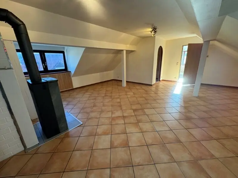 GRÖDIG - Geräumiges 2,5 Zimmer Appartement im Dachgeschoss mit PKW-Stellplatz