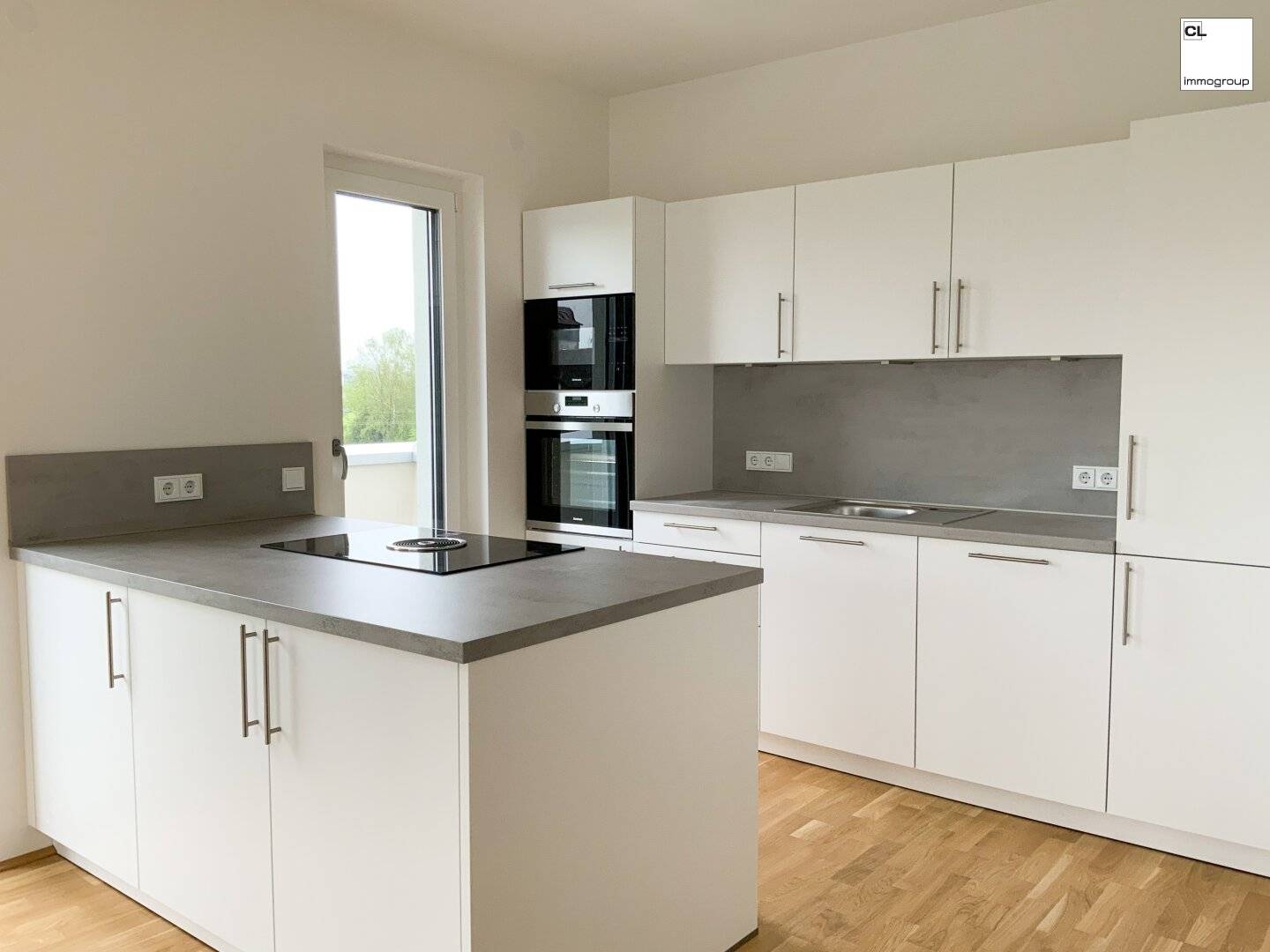 Generously planned living spaces, modern open living kitchen, large sunny terrace, underground garage