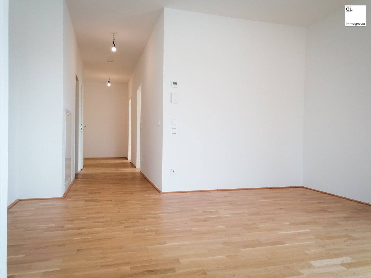 Generously planned living spaces, modern open living kitchen, large sunny terrace, underground garage