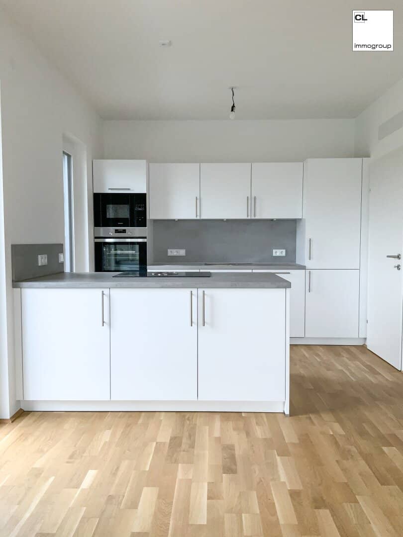 Generously planned living spaces, modern open living kitchen, large sunny terrace, underground garage