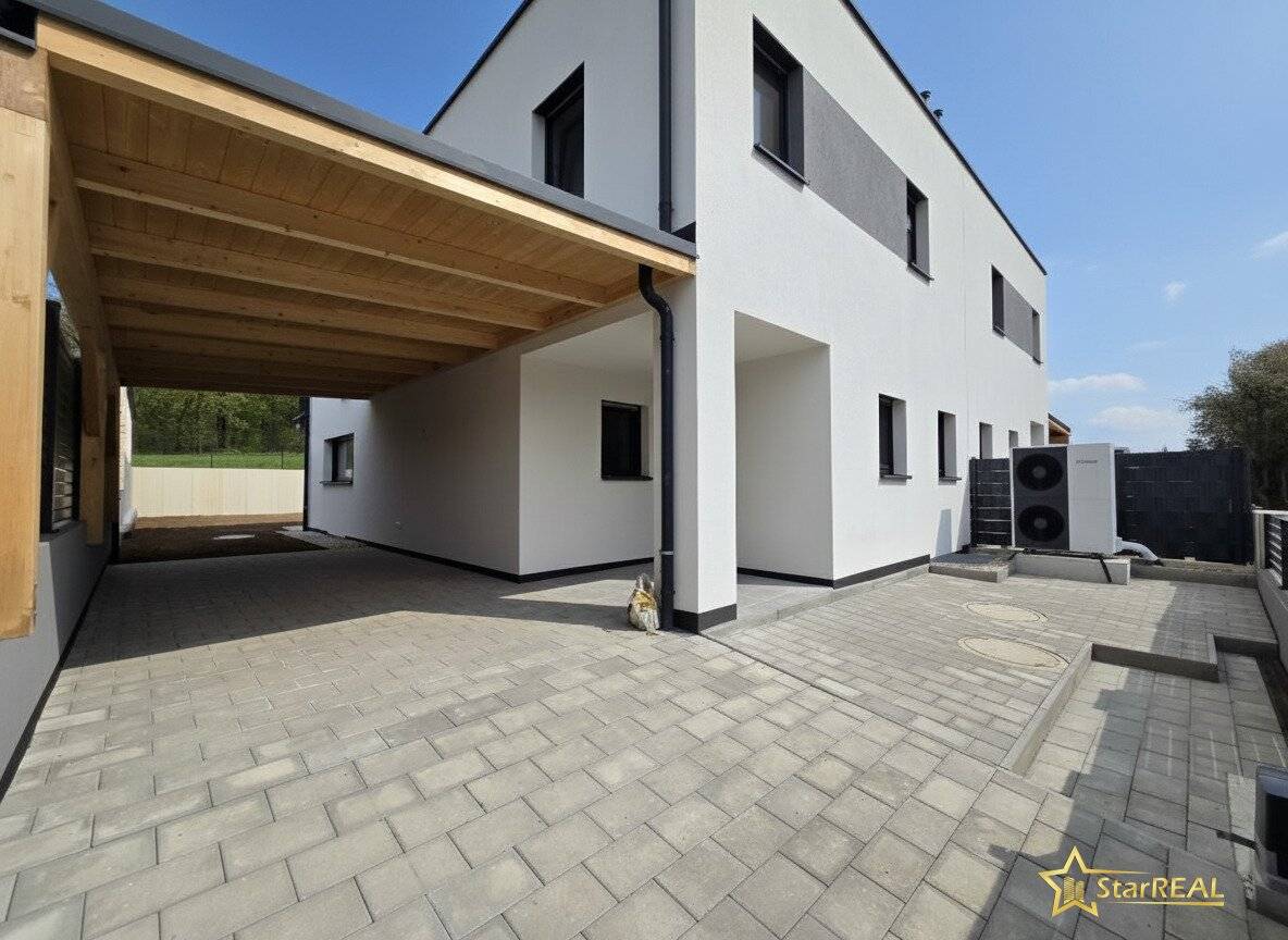 207 m² usable area 5 rooms cellar balcony terrace carport and large garden brick quality with stunning green view
