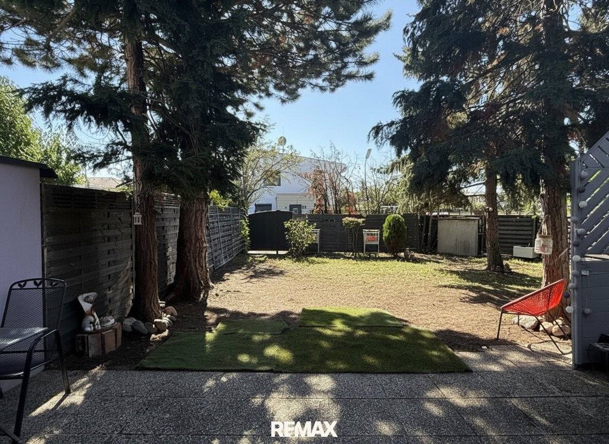 SOLD Corner terraced house in large garden format with underground garage space