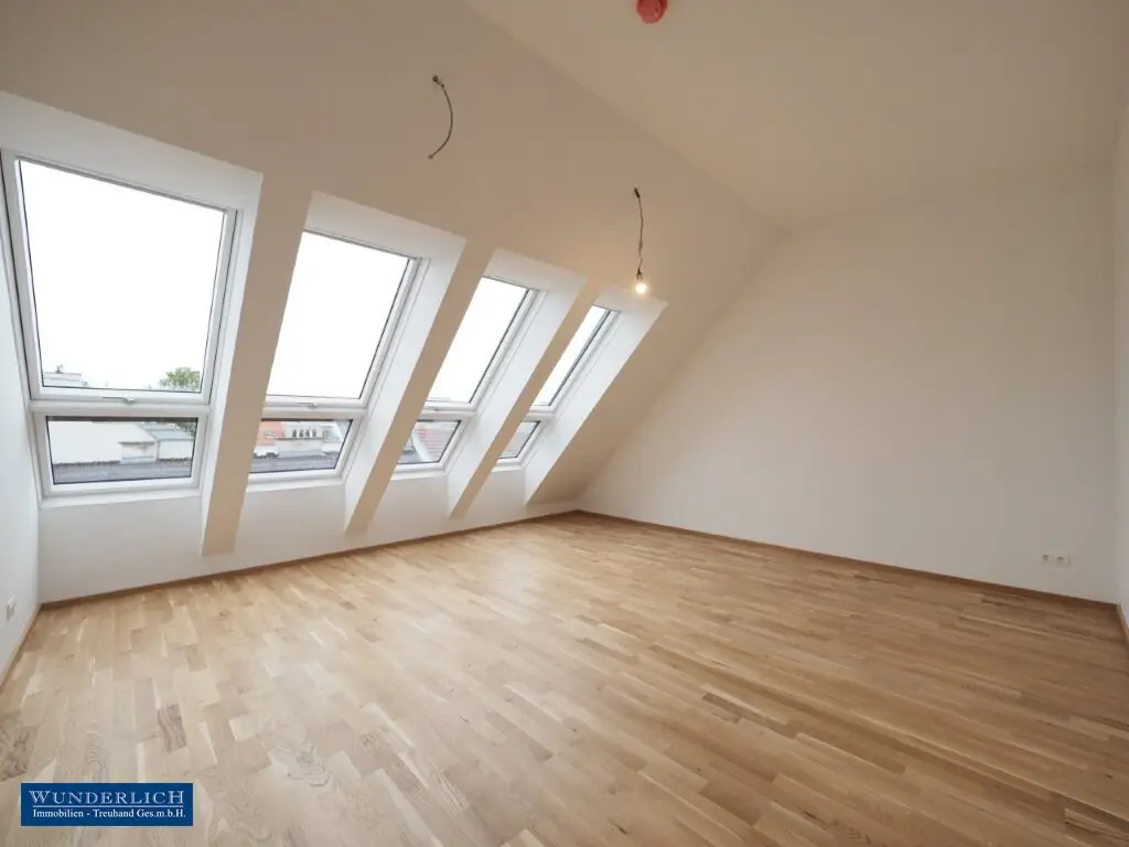 Dachgeschosswohnung mit großem Balkon Top-Erstbezug