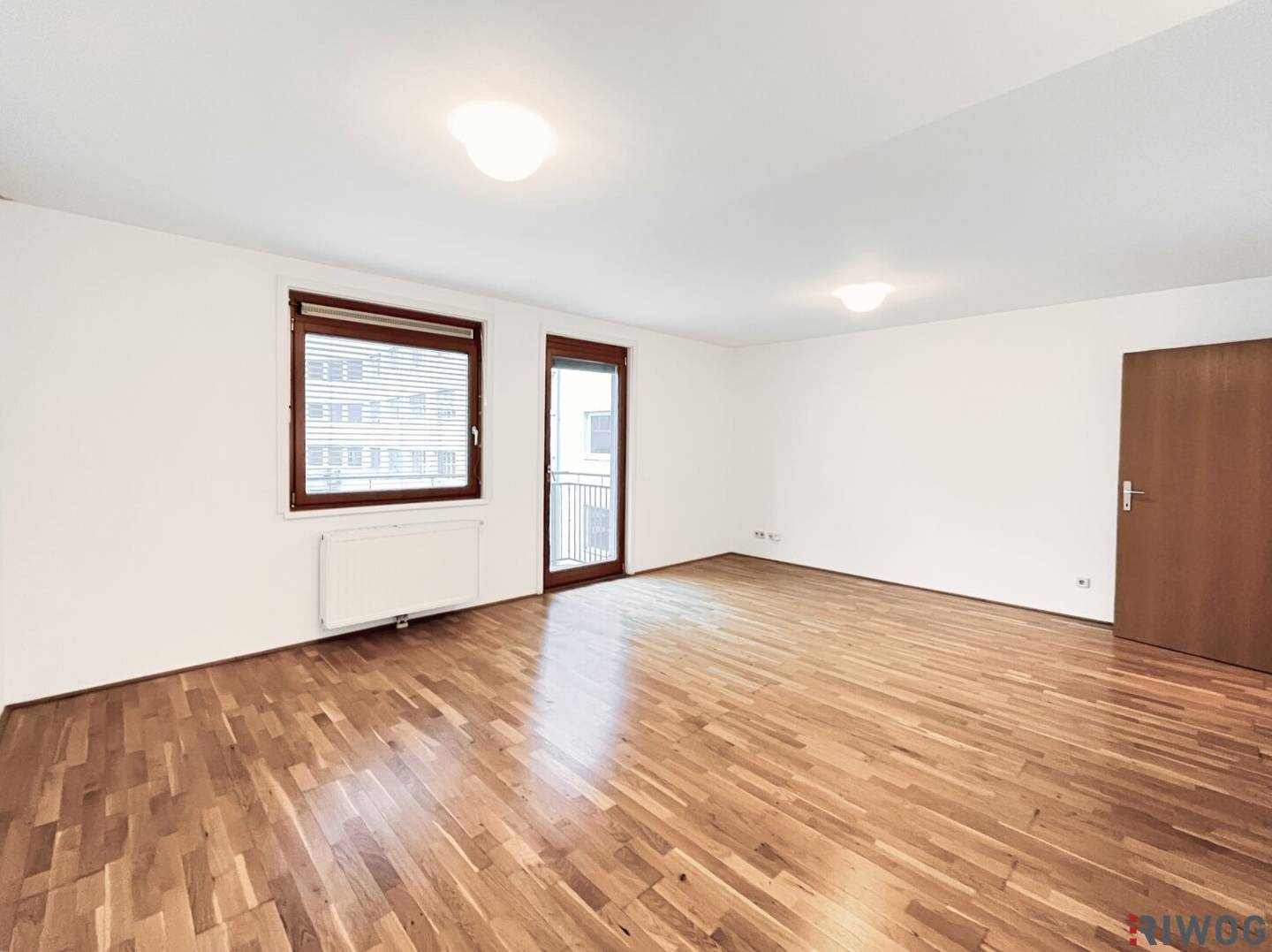 Newly built apartment with south facing balcony in a quiet courtyard and garage | fitted kitchen | near subway and Danube Island