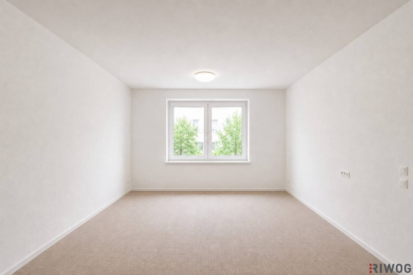 New build apartment with a green view and a 4 room possibility in a well kept house