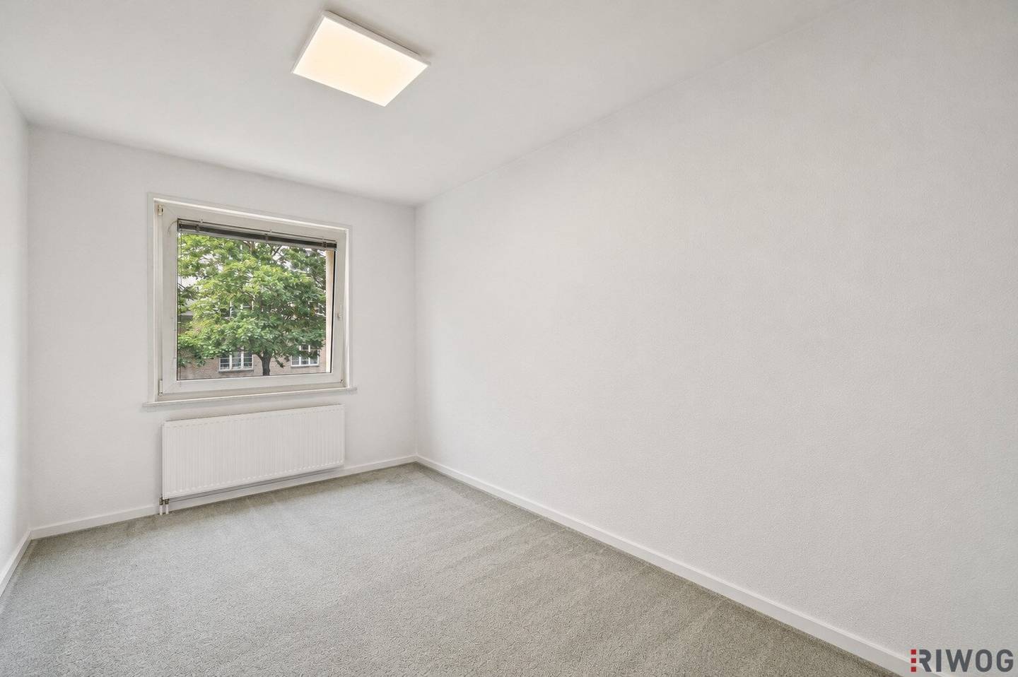New build apartment with a green view and a 4 room possibility in a well kept house