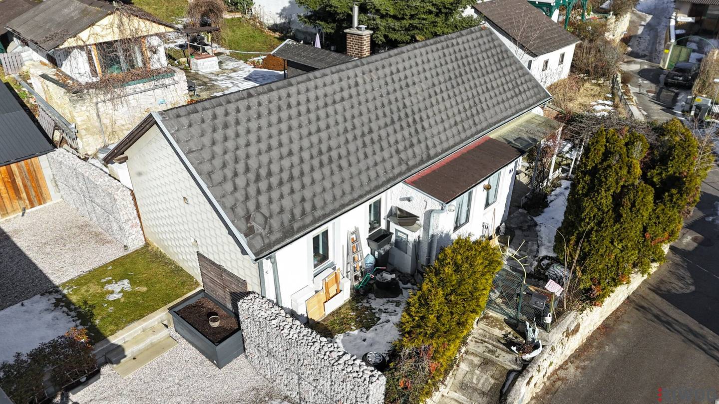 ENTZÜCKENDES KLEINFAMILIENHAUS MIT WEINKELLER / SCHÖNER GARTEN MIT TERRASSE, GRILLHÜTTE UND SCHUPFEN / VIEL POTENZIAL / RUHIGE SIEDLUNGSLAGE