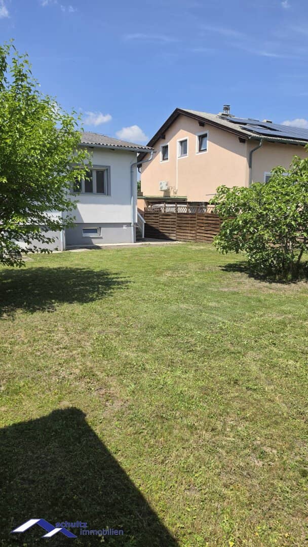 SCHULTZ IMMOBILIEN - Modern single-family house with conservatory and dreamlike garden in a quiet location in Wiener Neudorf