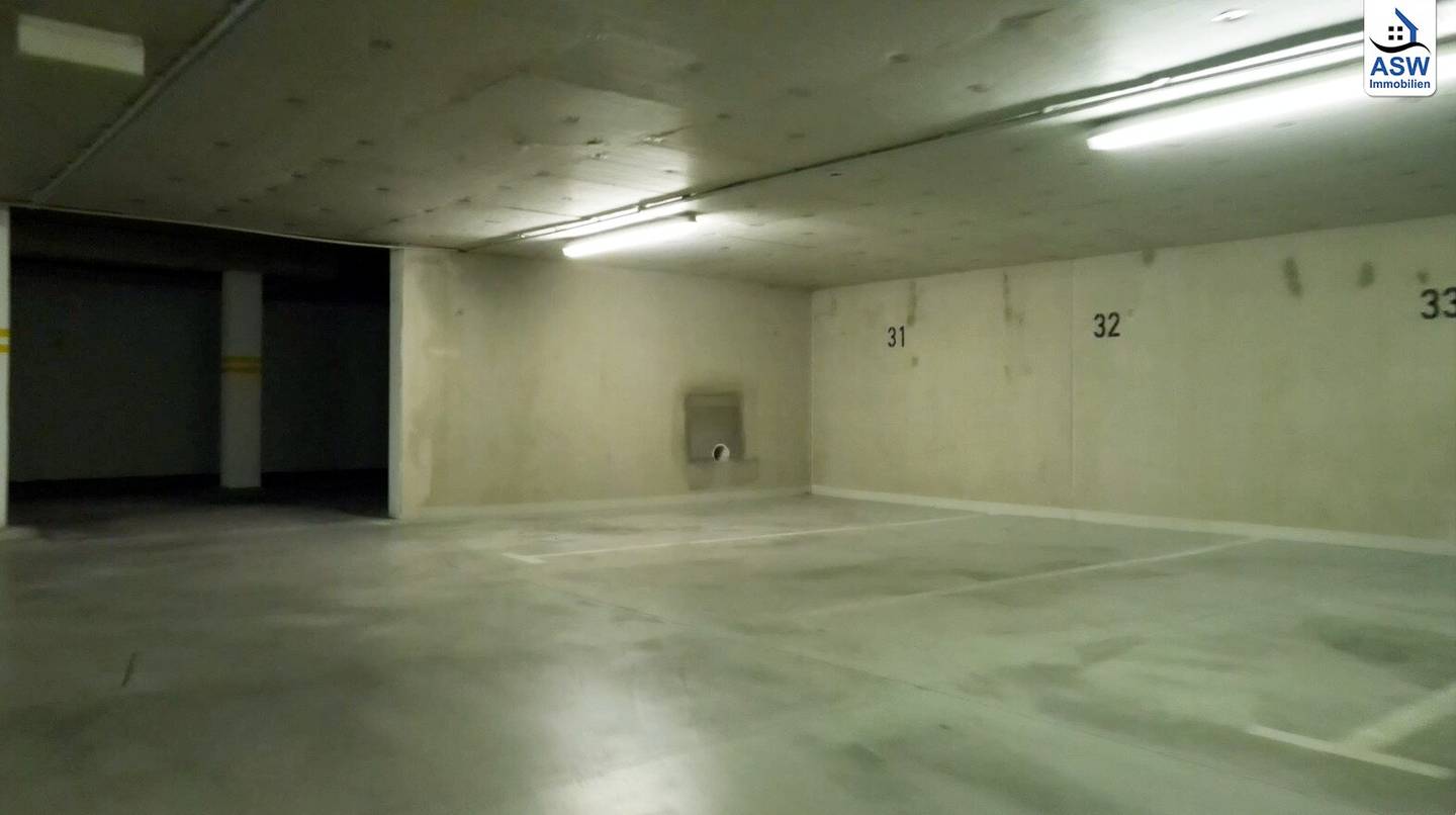 Ground-level parking space in a nice underground garage near Penzing train station