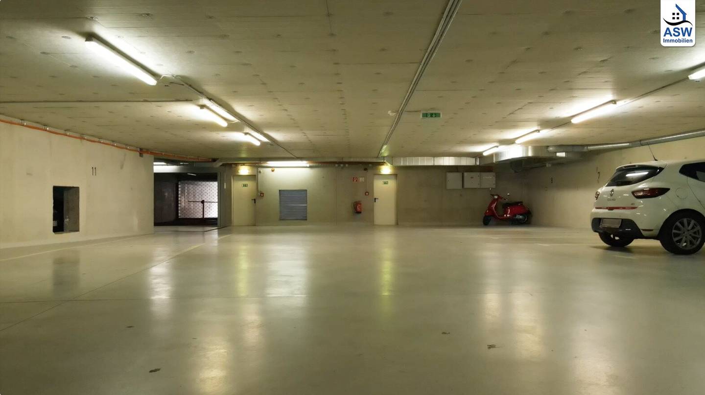 Ground-level parking space in a nice underground garage near Penzing train station