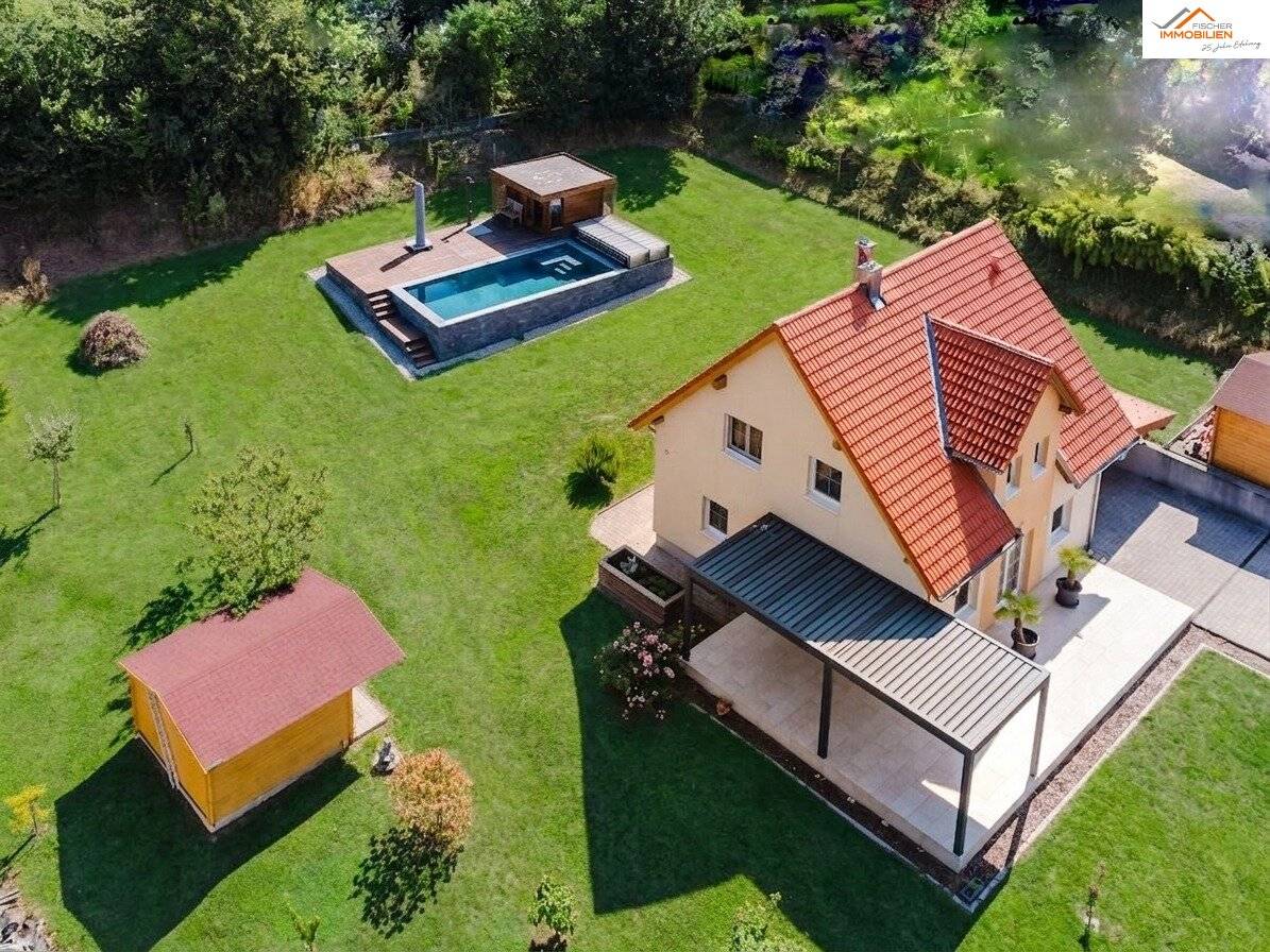 Exklusives Einfamilienhaus auf 2.212 m² Grundstück in ruhiger Wohnlage mit Pool