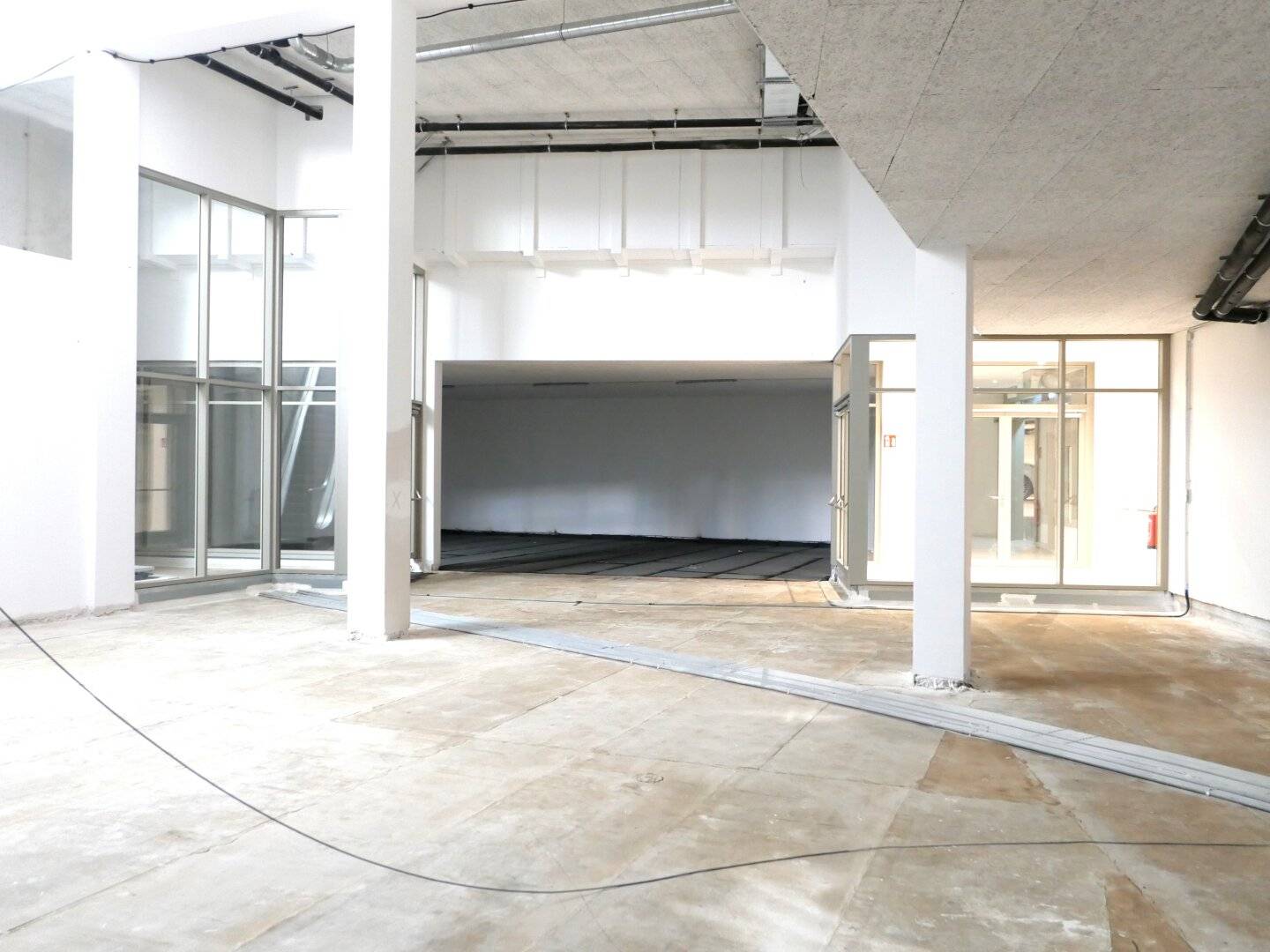 Landmark space near the Old Town with partly 15 m ceiling height and first occupancy in shell condition