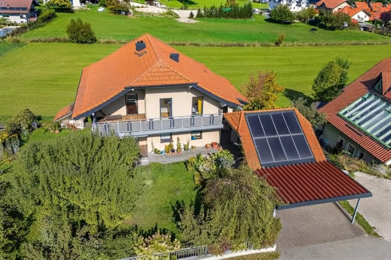 Top two family house in Koppl near Salzburg with a granny flat, two balconies, a garage, solar system and living space ventilation