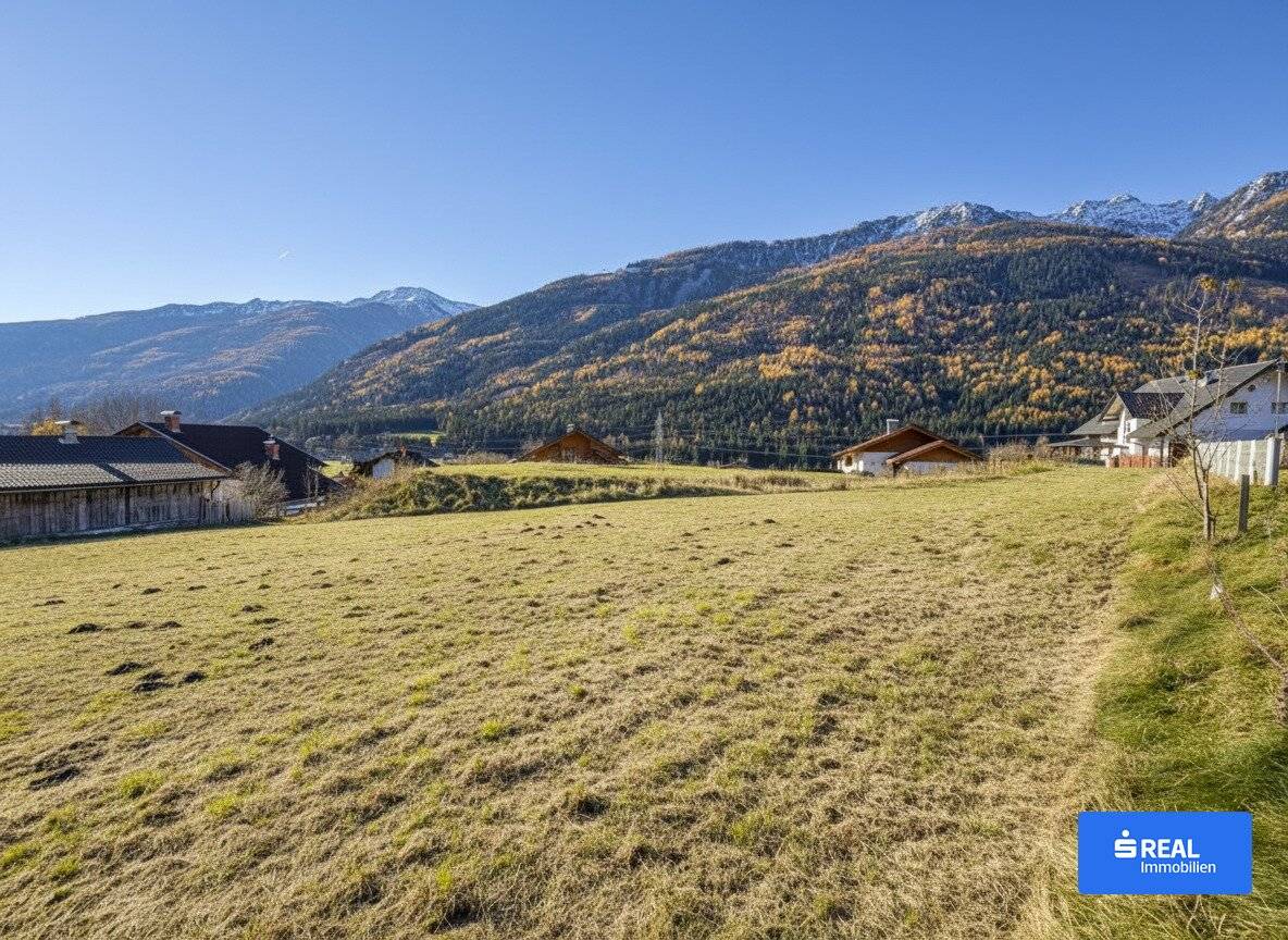 Behind the blue of the mountains