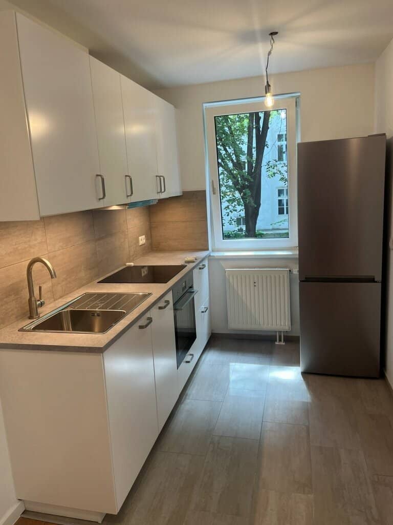Enchanting, thoroughly renovated 2 room apartment and car parking space in a top location of the 4th district
