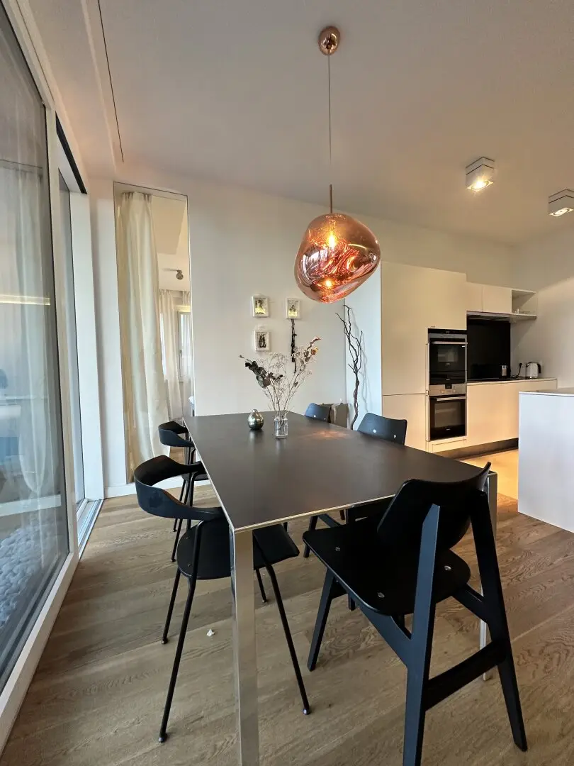 Stylish living in the villa area: Modern apartment with garden view
