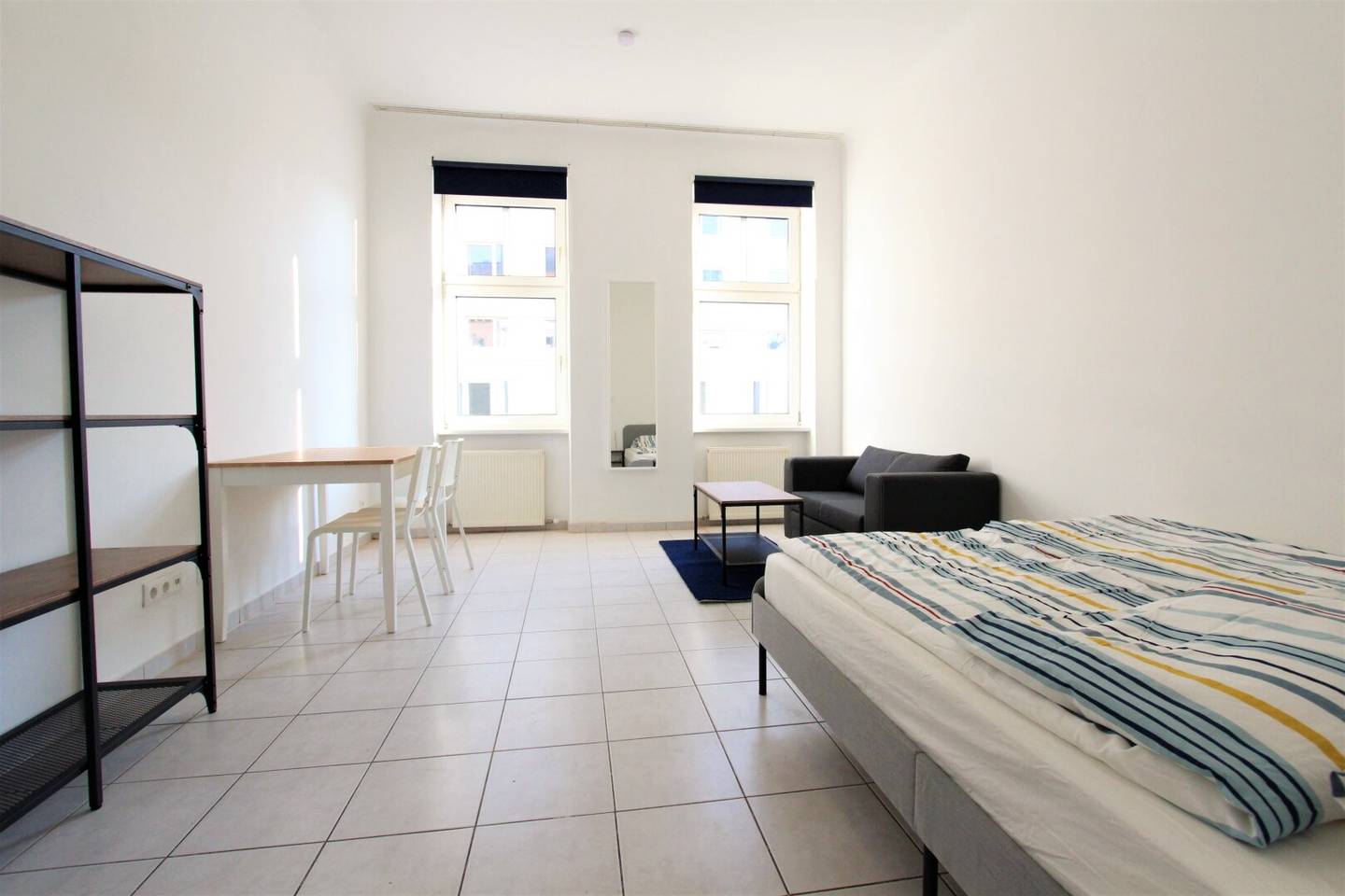 Sunny furnished one room apartment in a central location short term rental