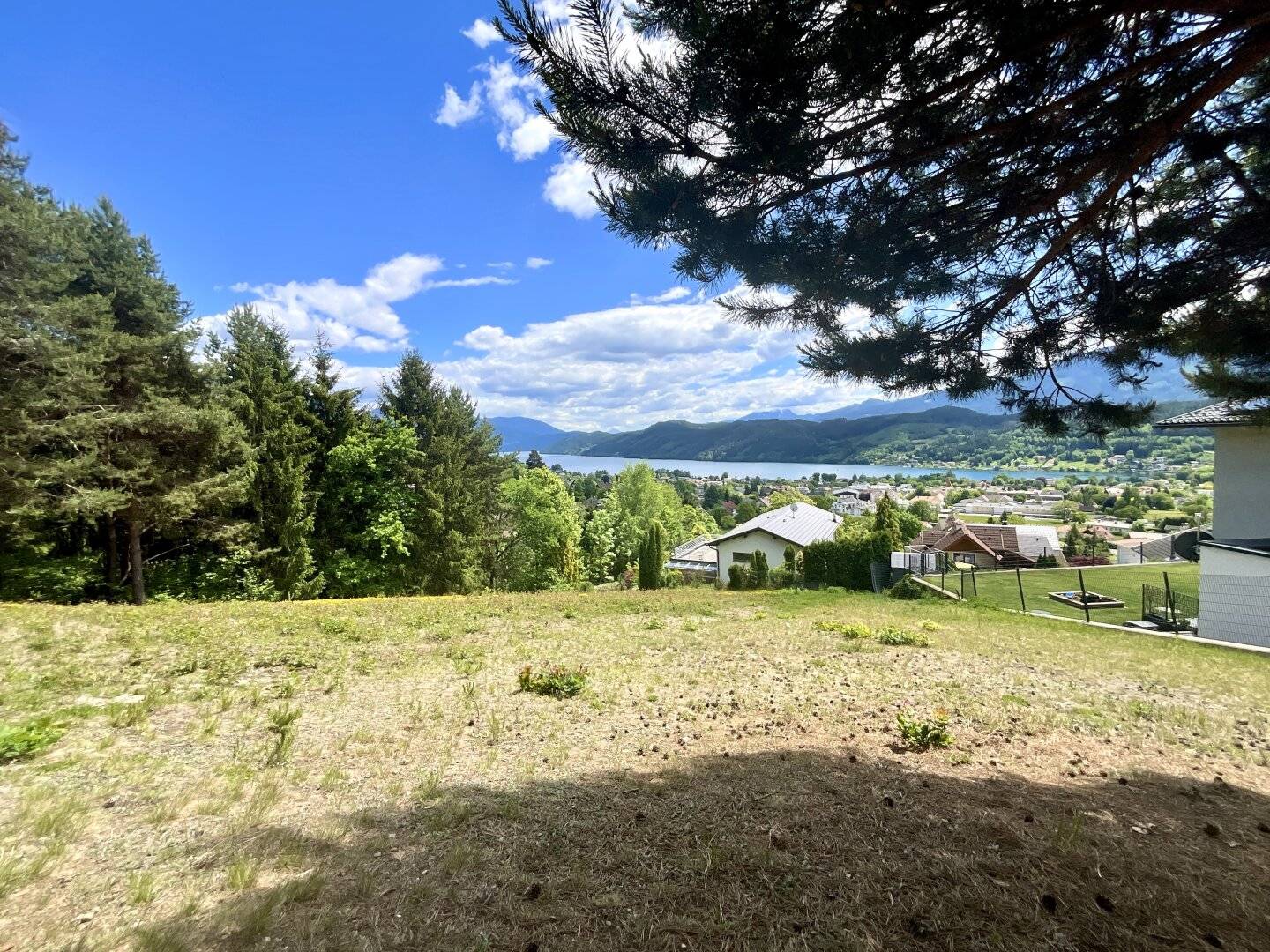 EIN PLATZ FÜR GROSSE GEFÜHLE AM MILLSTÄTTER SEE – PREMIUM-BAUGRUNDSTÜCK MIT ATEMBERAUBENDEM SEE- UND BERGBLICK