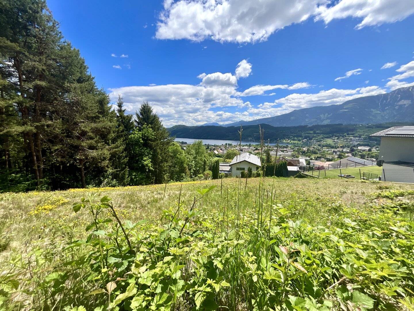 EIN PLATZ FÜR GROSSE GEFÜHLE AM MILLSTÄTTER SEE – PREMIUM-BAUGRUNDSTÜCK MIT ATEMBERAUBENDEM SEE- UND BERGBLICK