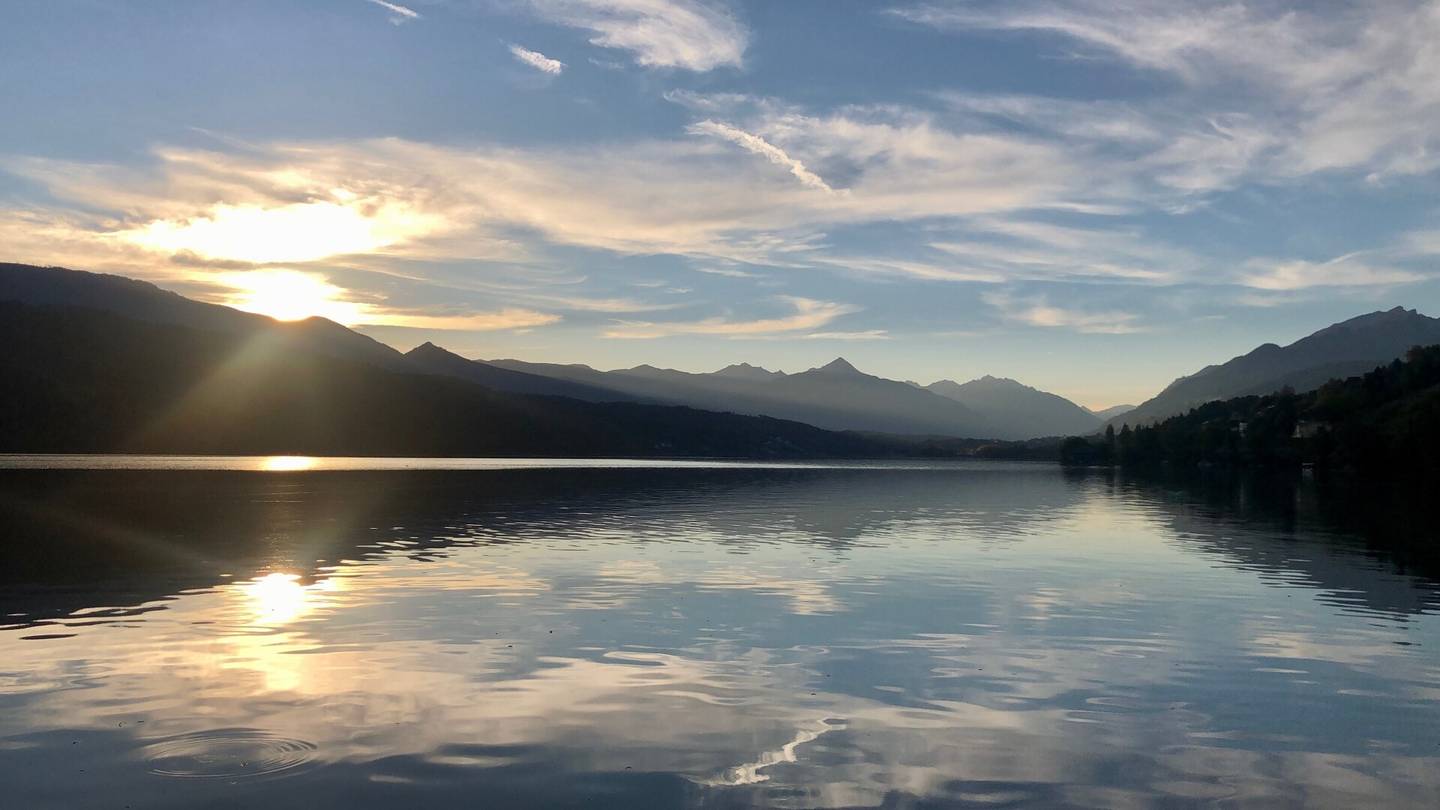 Living in the heart of Millstatt with unparalleled view, sun and the coveted possibility of lake access