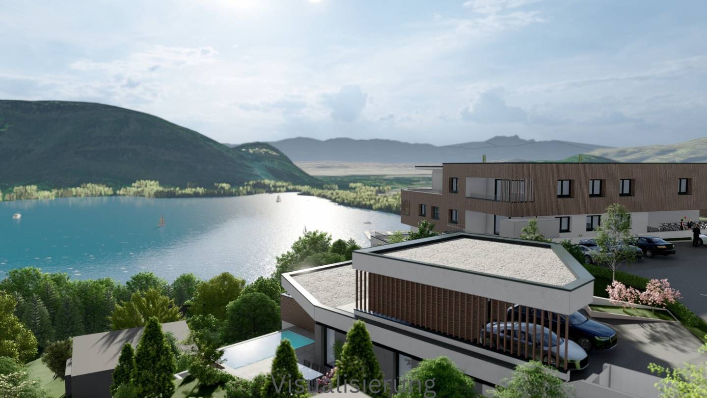 IHR EXKLUSIVER RÜCKZUGSORT AM OSSIACHER SEE! SENSATIONELLES BAUGRUNDSTÜCK INKLUSIVE EINEM BEWILLIGTEN EINFAMILIENWOHNHAUS MIT UNBESCHREIBLICHEM SEE-, BERG- UND WEITBLICK!