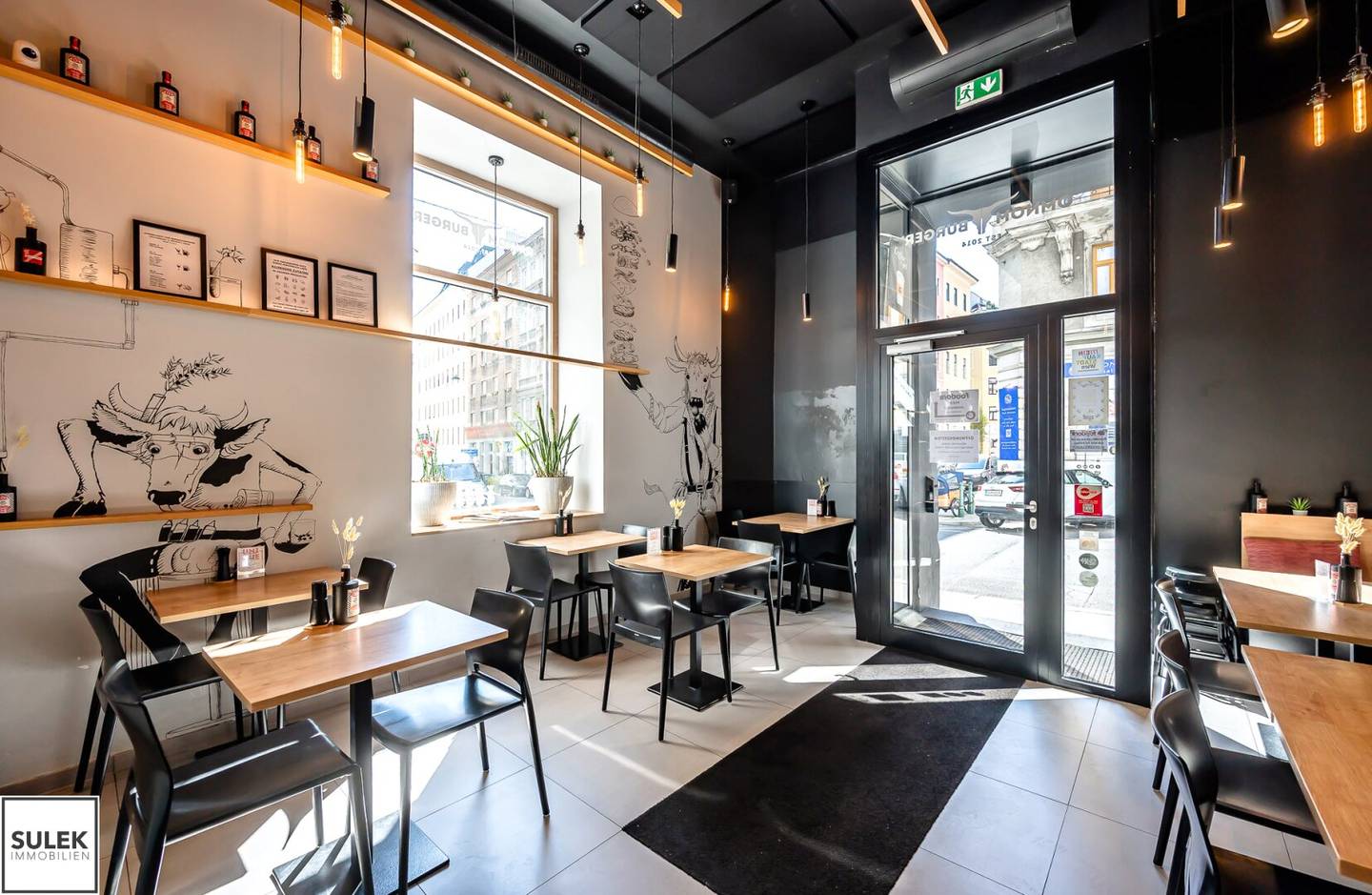 Modern gastronomy business (restaurant) with outdoor seating near Volksoper
