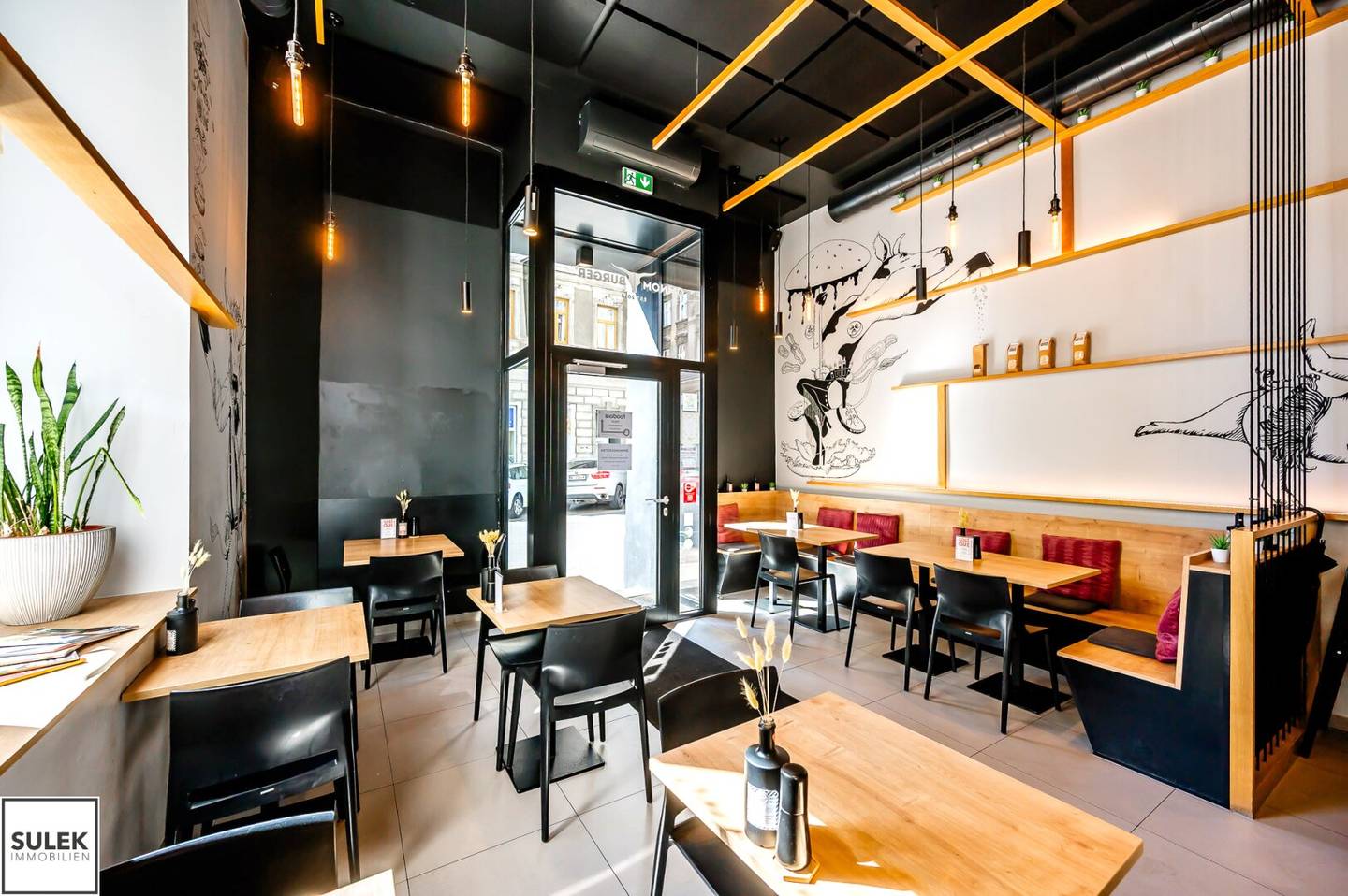 Modern gastronomy business (restaurant) with outdoor seating near Volksoper