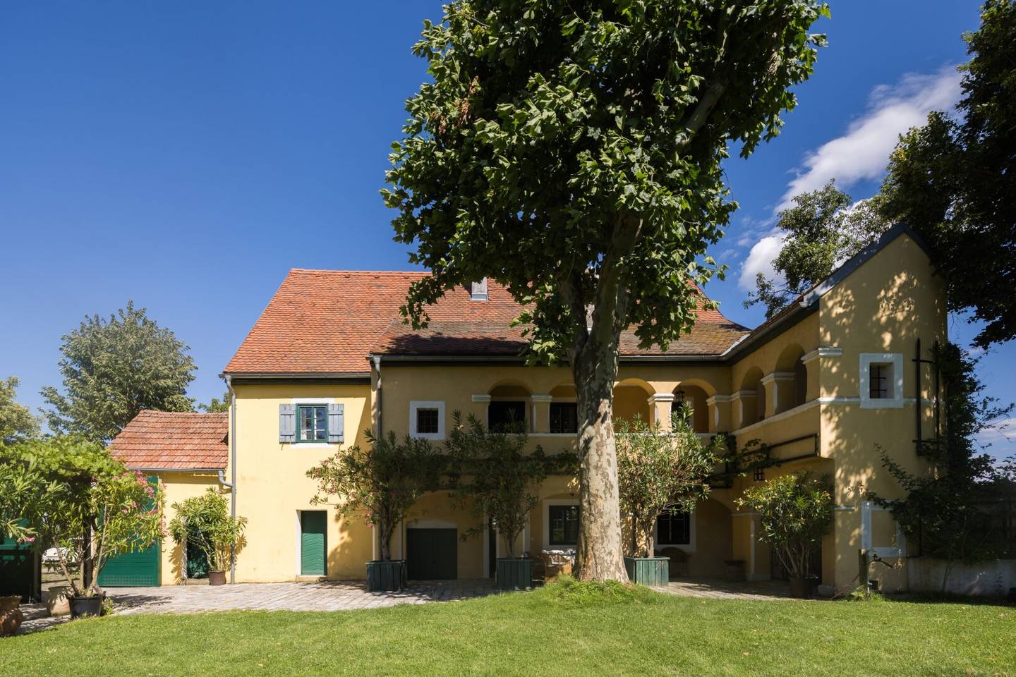 Historic mill amidst meadows and fields, not far from Vienna
