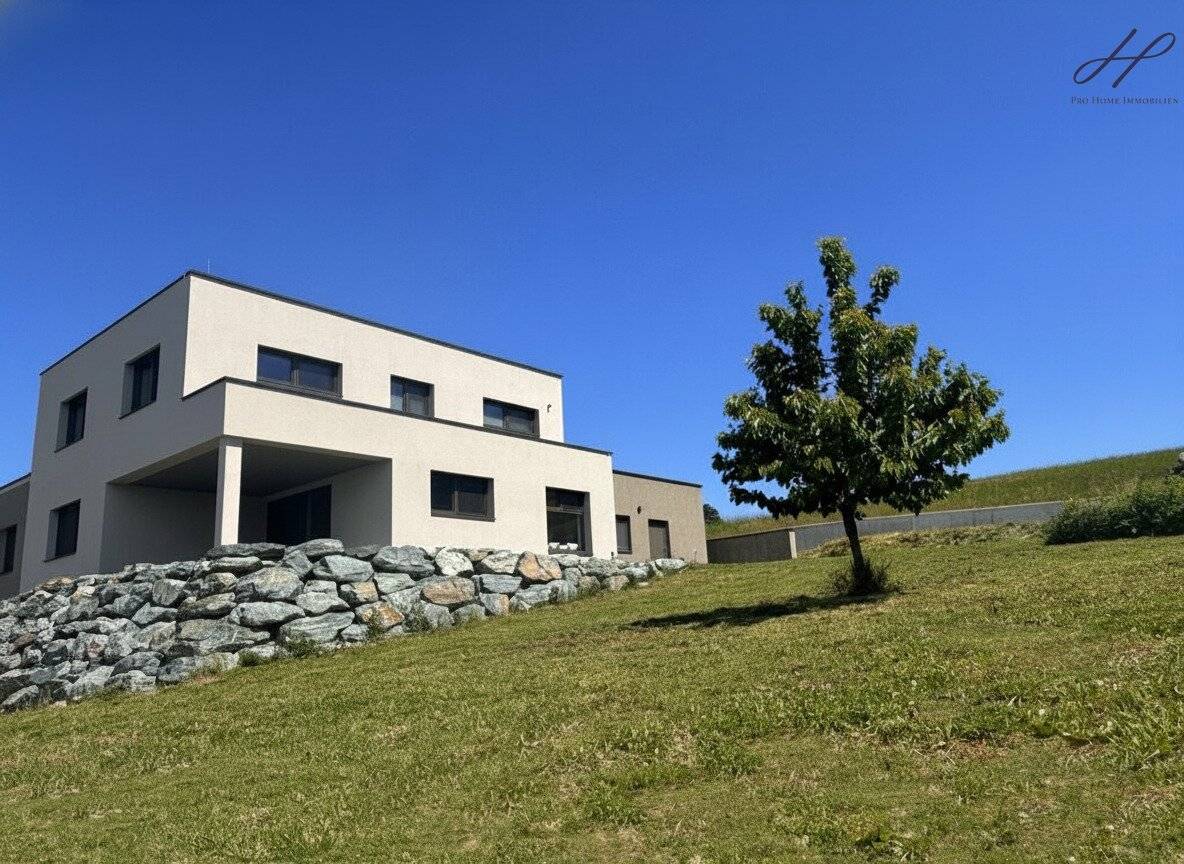 Exklusives Einfamilienhaus in sonniger Hanglage