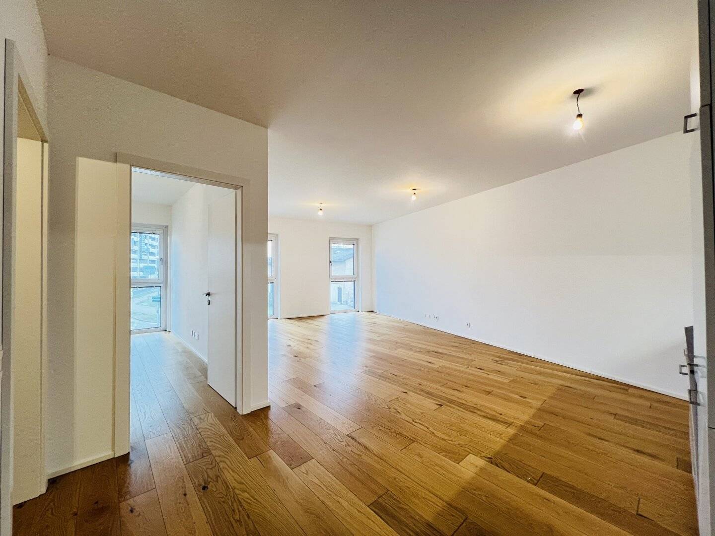 Q11 – Sonnendurchflutet & stilvoll – Ihr neues Zuhause in perfekter Lage