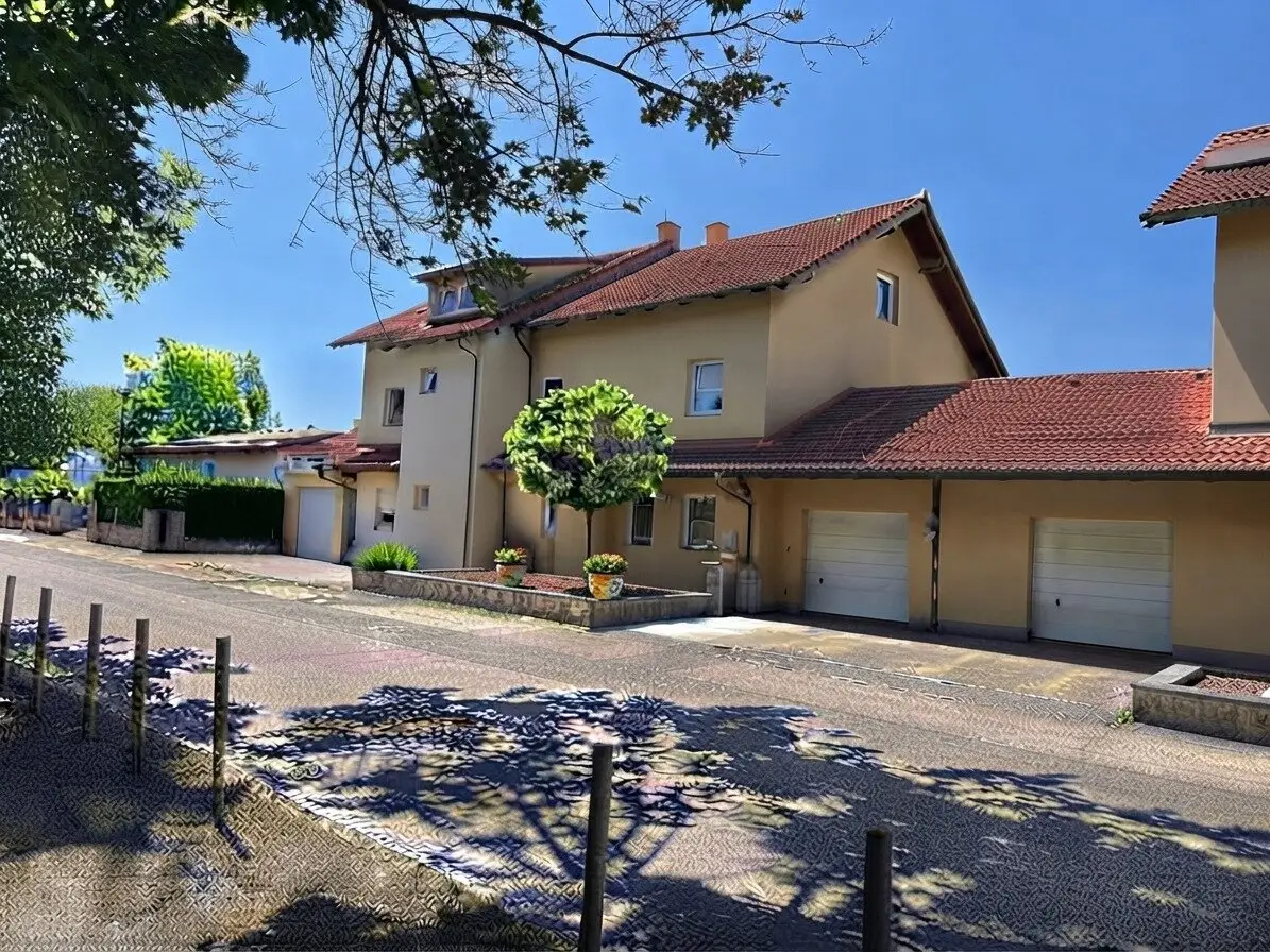 Spacious, fully basemented terraced house with garden, garage and approx. 245 m² total usable area in Ansfelden