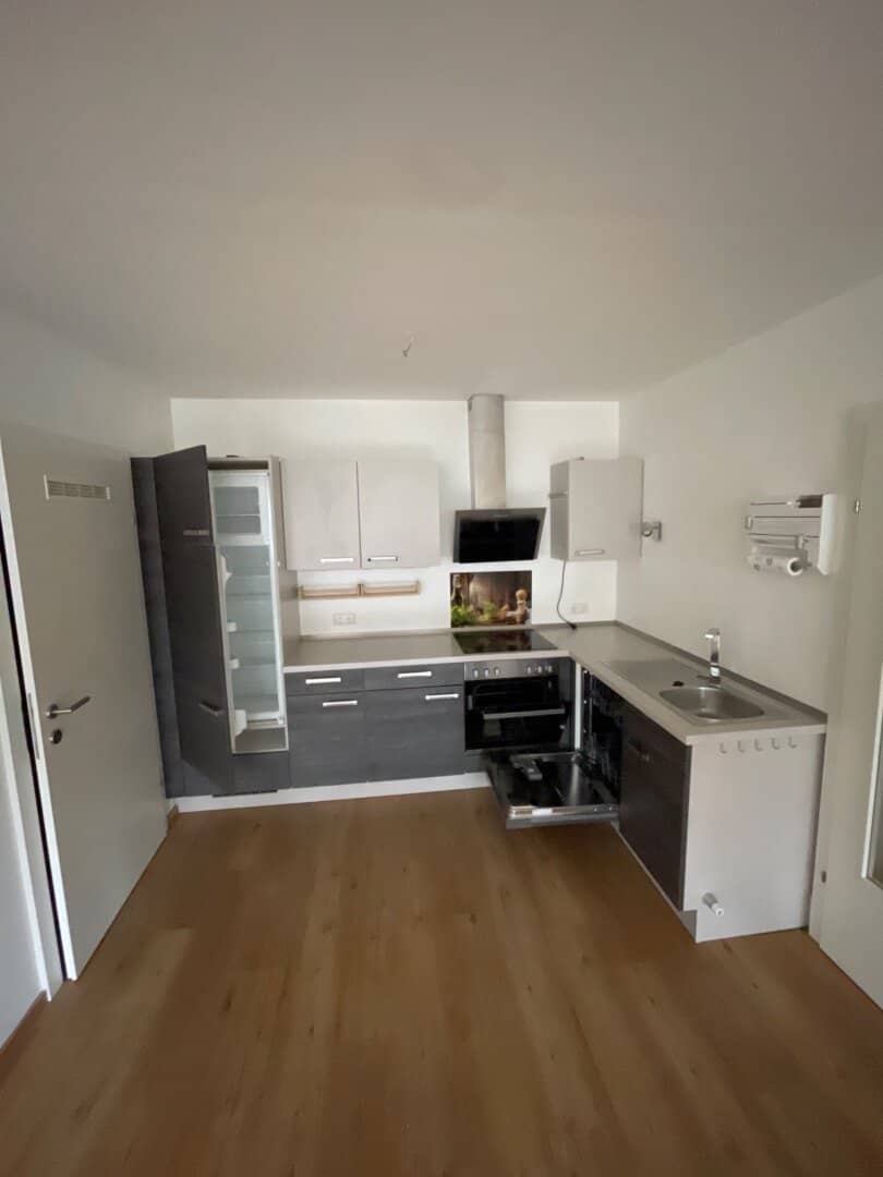 Like-new two room apartment with furnished kitchen and parking space in the center of Gurten