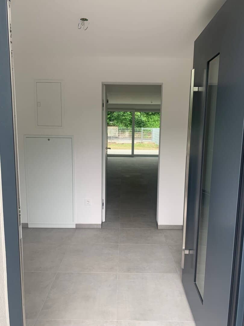 Gut vermietete Erstbezugs-Maisonettewohnung mit überdachter Terrasse und Garage