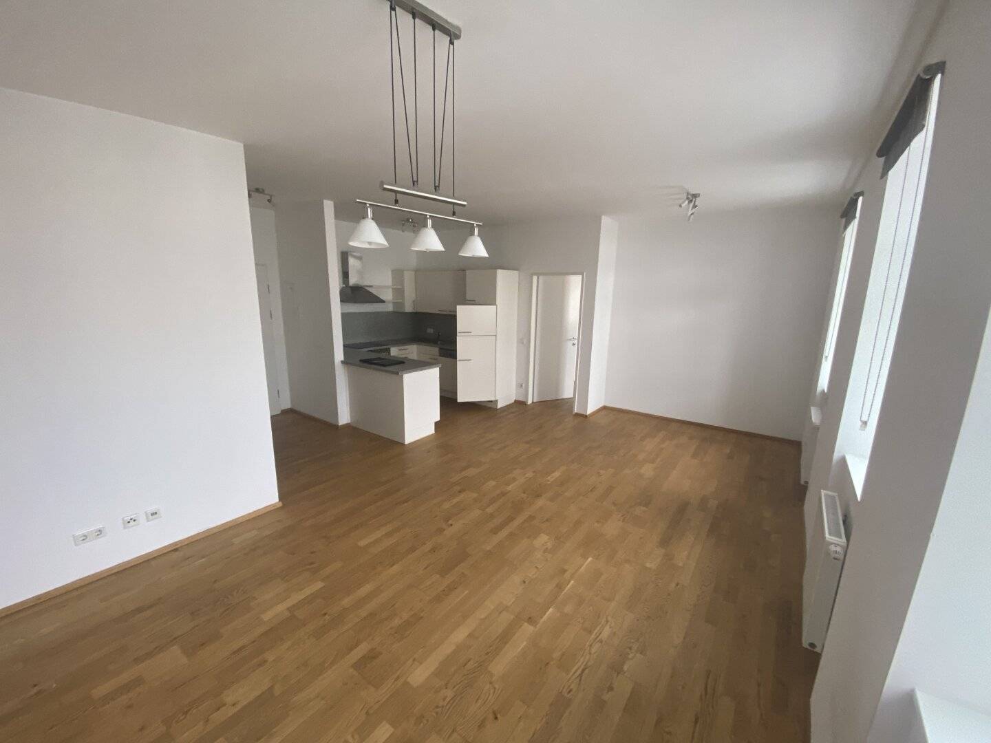 Spacious, centrally located, bright two room apartment with furnished kitchen in Ried