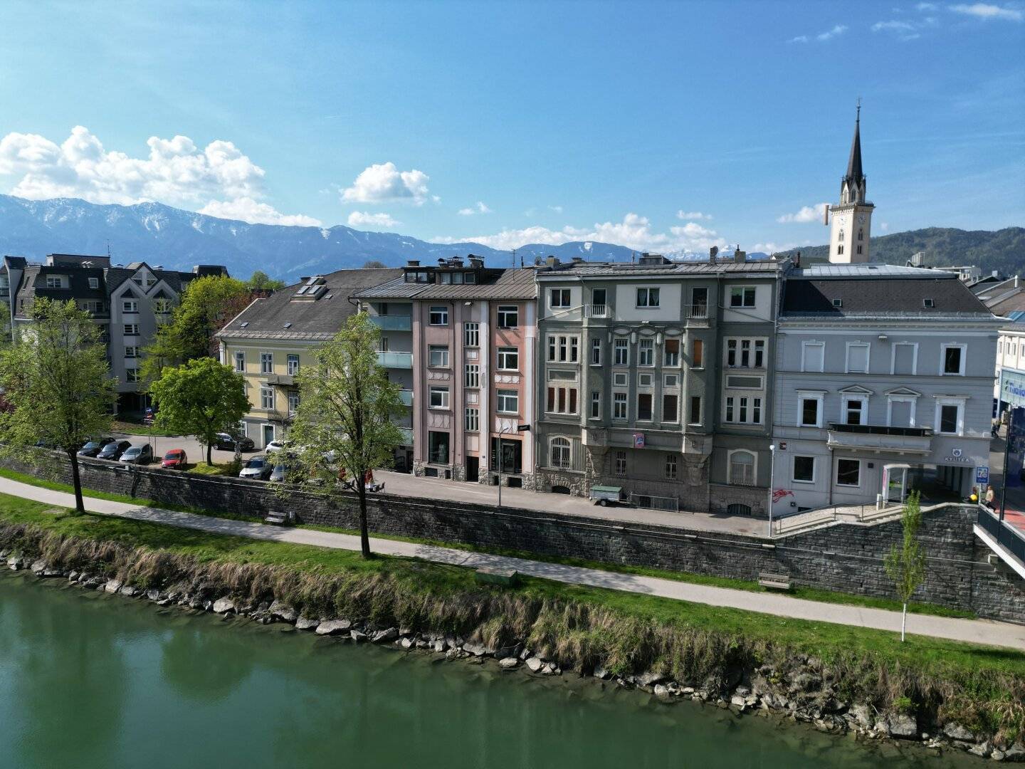 Investment property in a premier location in Villach directly on the Drau river bank with attractive development potential for sale