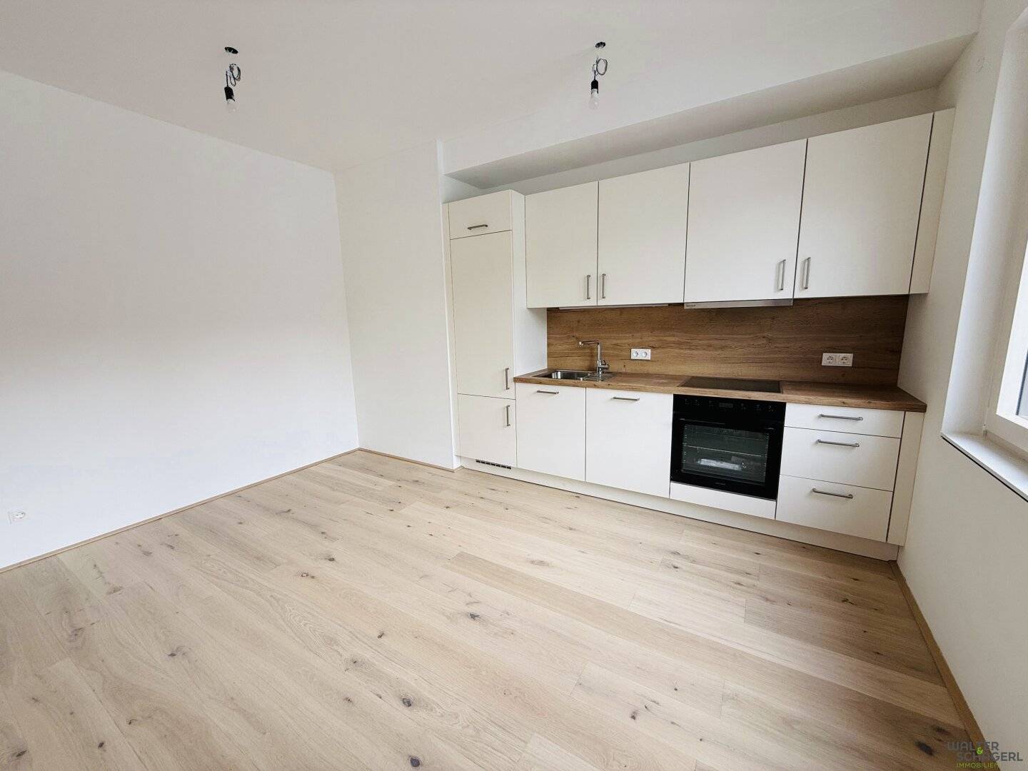 Design meets Location Stylish two room in the center First occupancy Indonesian? Wait no