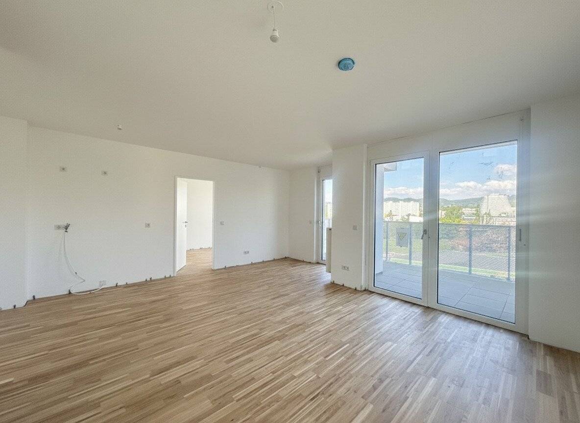 Bright two-room apartment with two balconies in first occupancy from July 2026