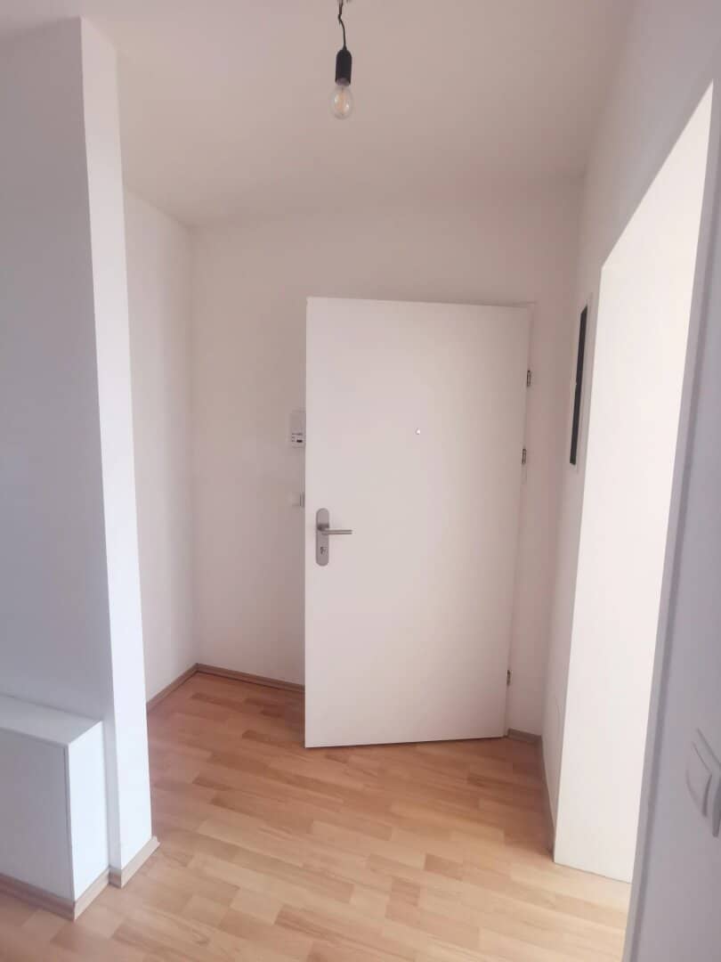 3 room attic apartment with balcony it is a natural translation of the German title, but we must not modify content; however the title should be faithful: 3 room attic apartment with balcony in this case
