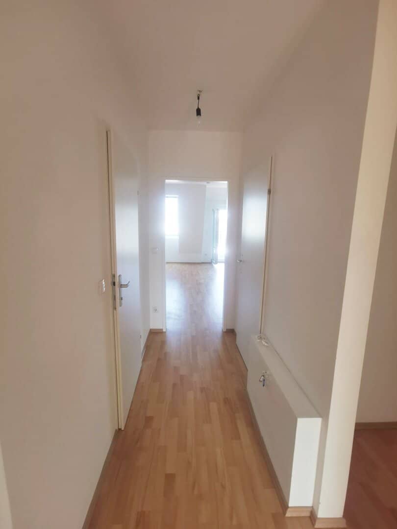 3 room attic apartment with balcony it is a natural translation of the German title, but we must not modify content; however the title should be faithful: 3 room attic apartment with balcony in this case