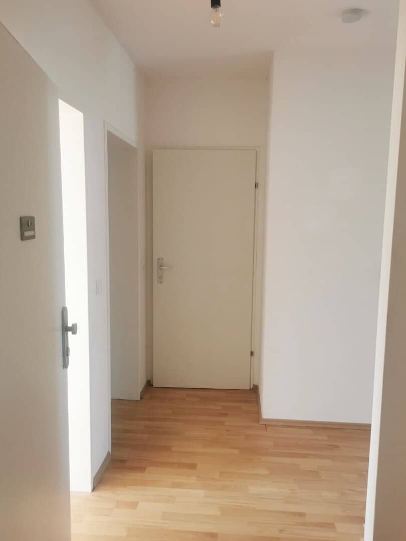 3 room attic apartment with balcony it is a natural translation of the German title, but we must not modify content; however the title should be faithful: 3 room attic apartment with balcony in this case