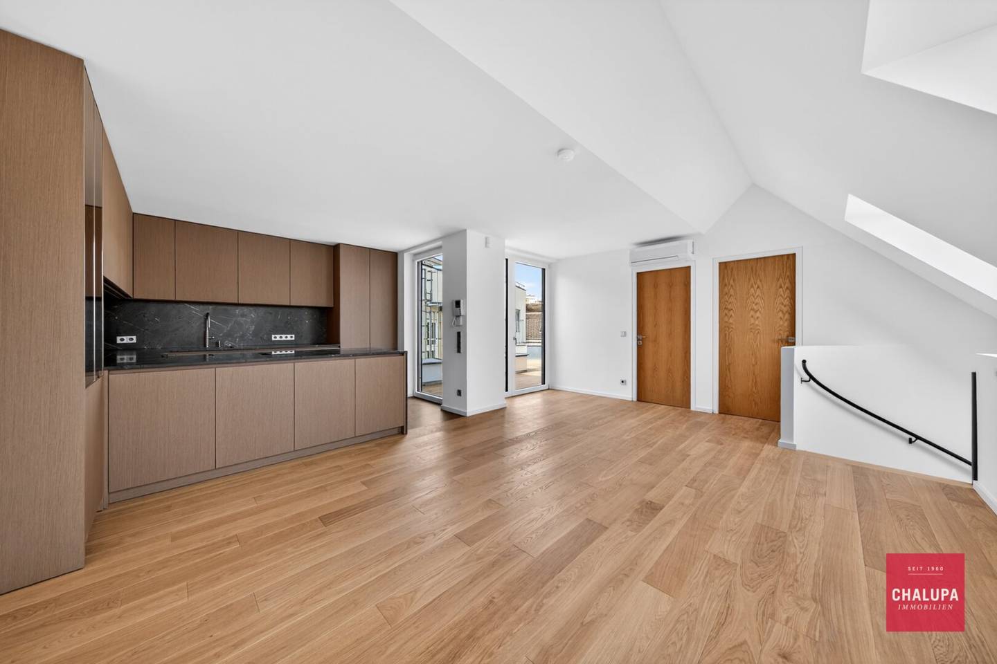 Exclusive attic duplex with 2 terraces and in-house garage parking space