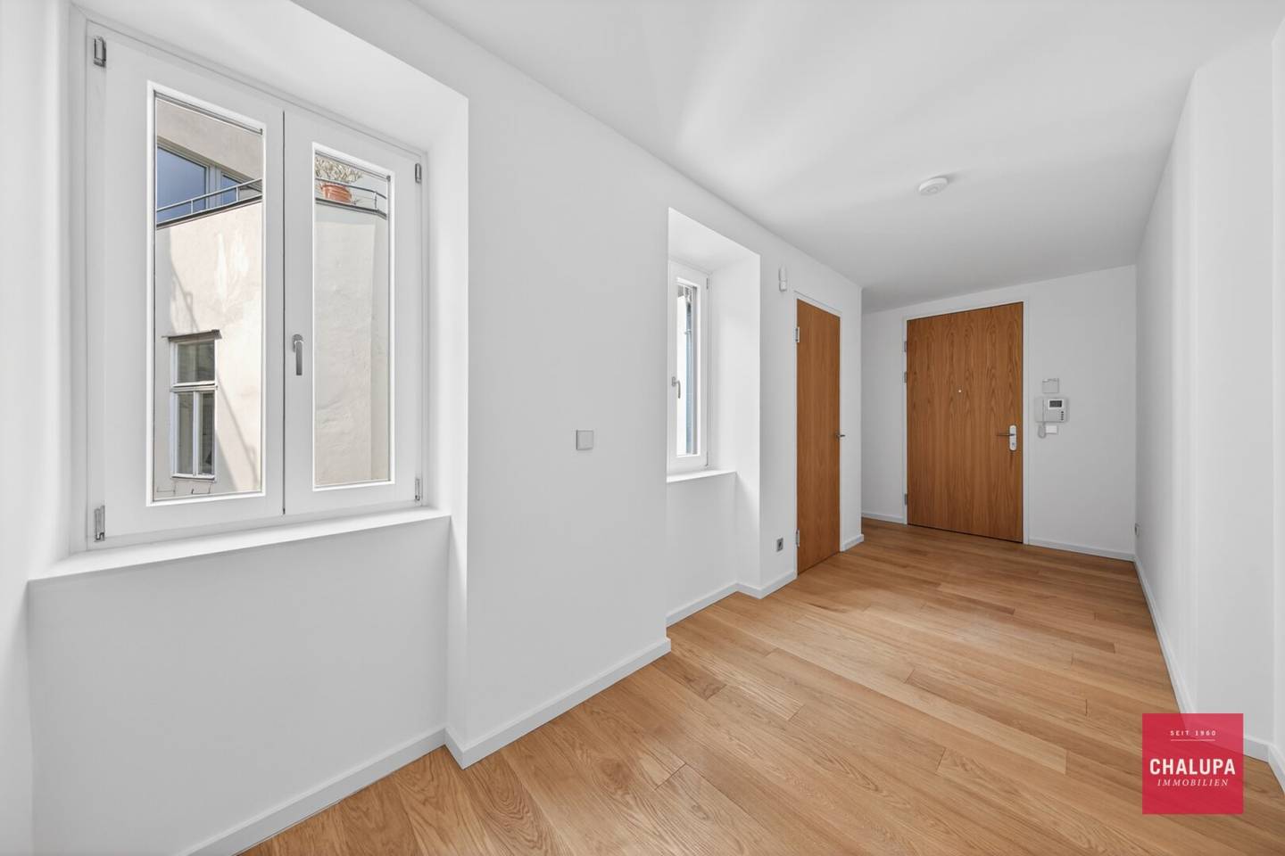 Exclusive attic duplex with 2 terraces and in-house garage parking space
