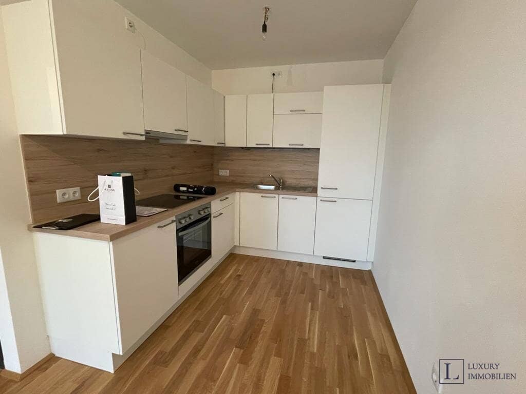 2-Zimmer-Wohnung & Tiefgaragenplatz incl., schöne Aussicht in begehrter Lage