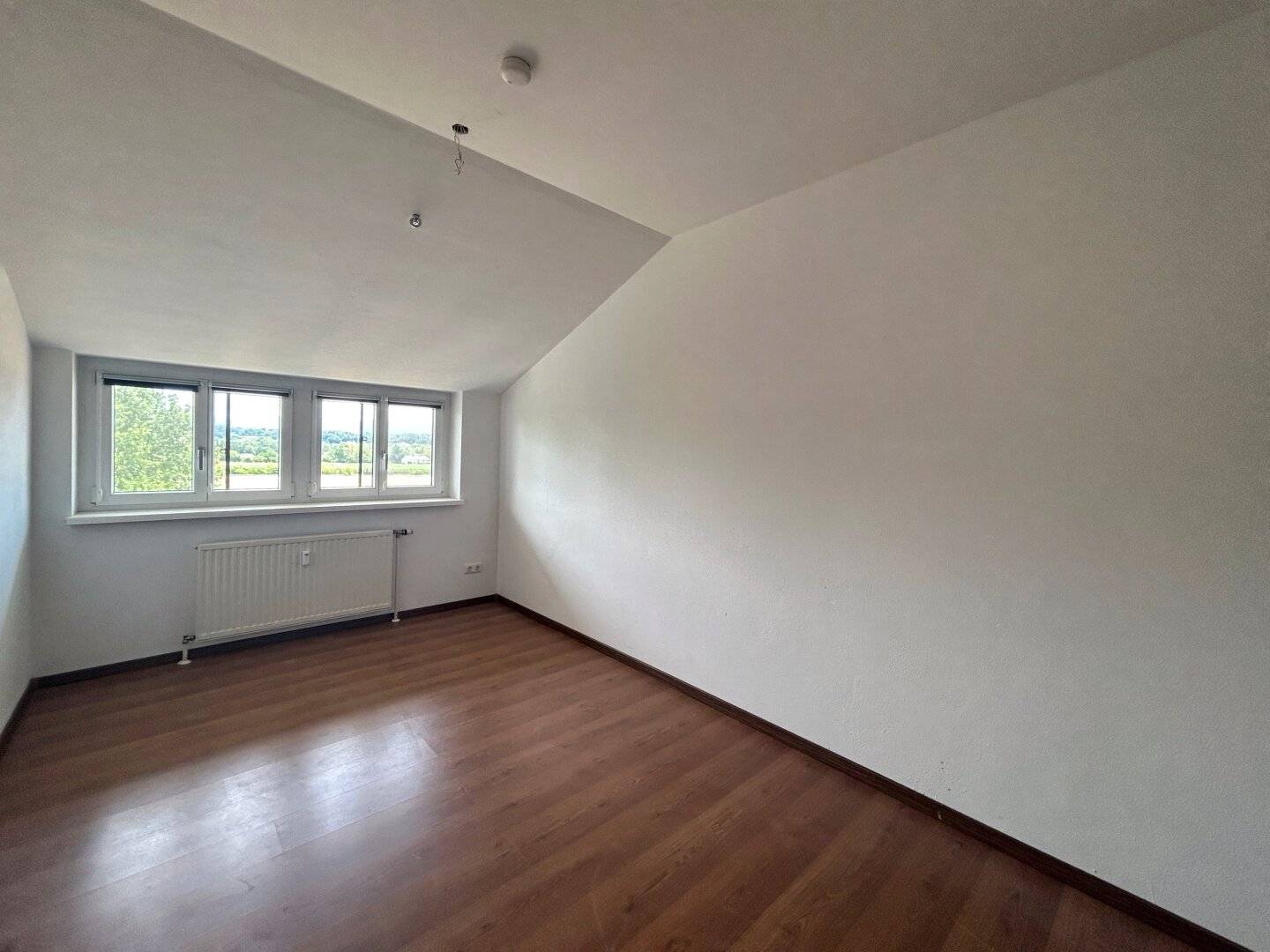 LIVING IN SCHWANENSTADT - 3 ROOM APARTMENT WITH BALCONY AND UNDERGROUND GARAGE