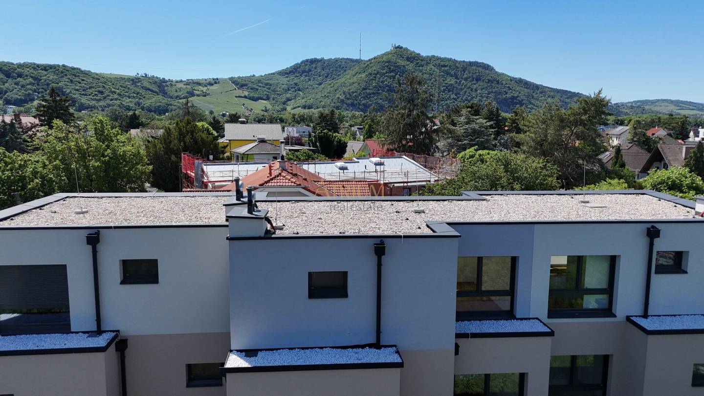 Terraced house with 5 rooms, garden and 2 terraces first occupancy