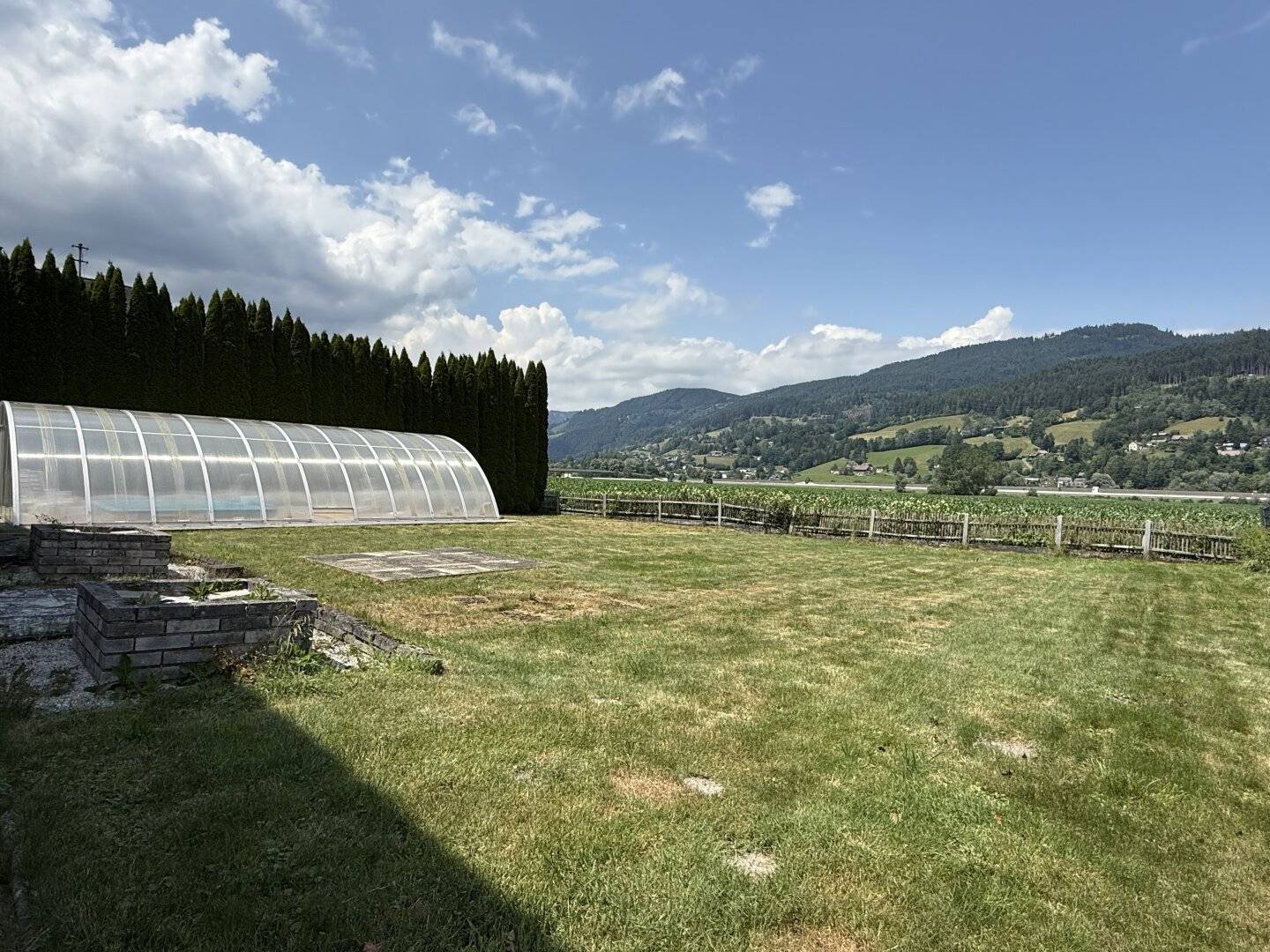Sunny, flat plot with pool
