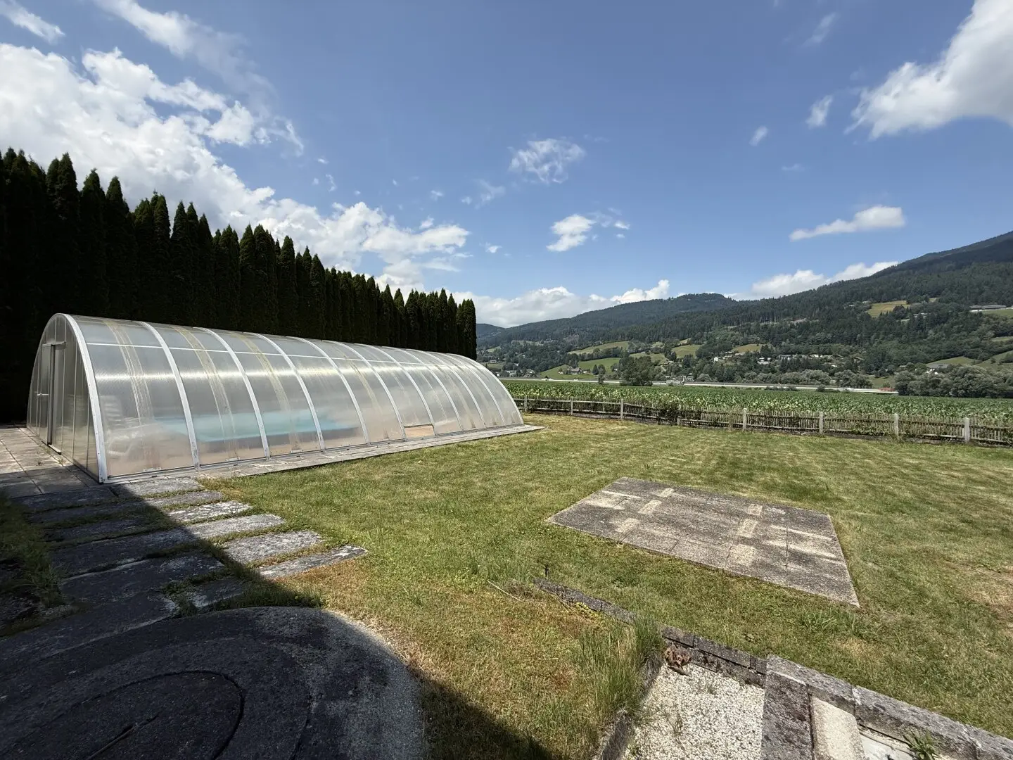Sunny, flat plot with pool