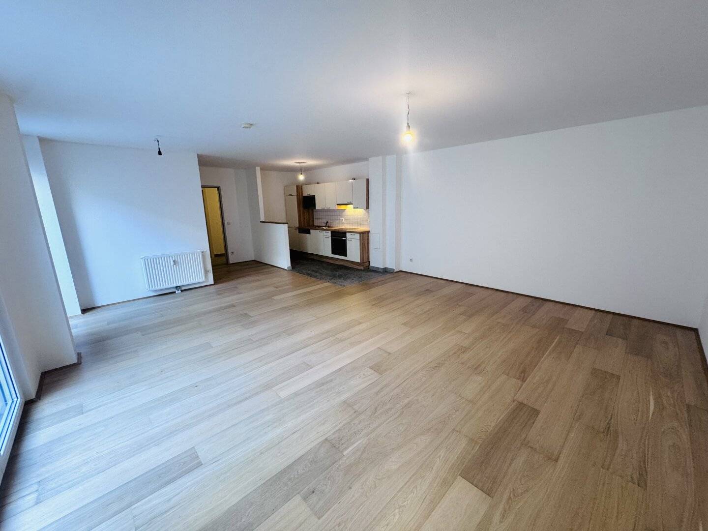 Großzügige  3-Zimmer-Neubauwohnung mit Eigengarten in ruhiger Innenhoflage