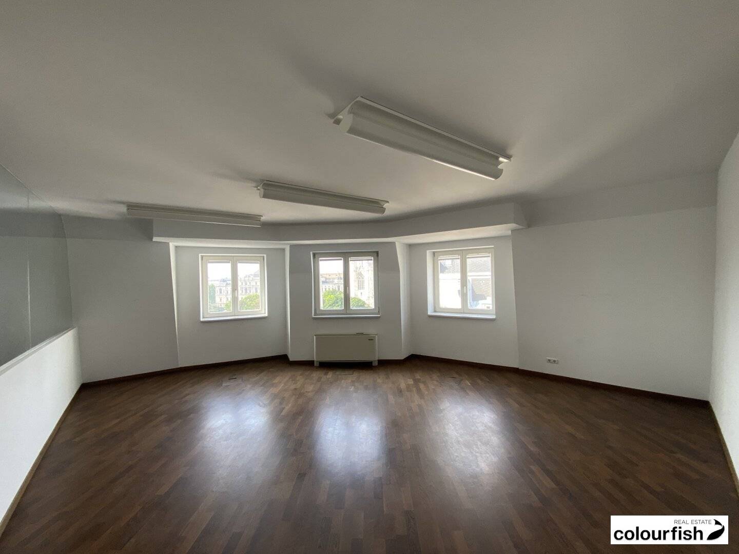 Attic office with Votivkirche view near Schottentor