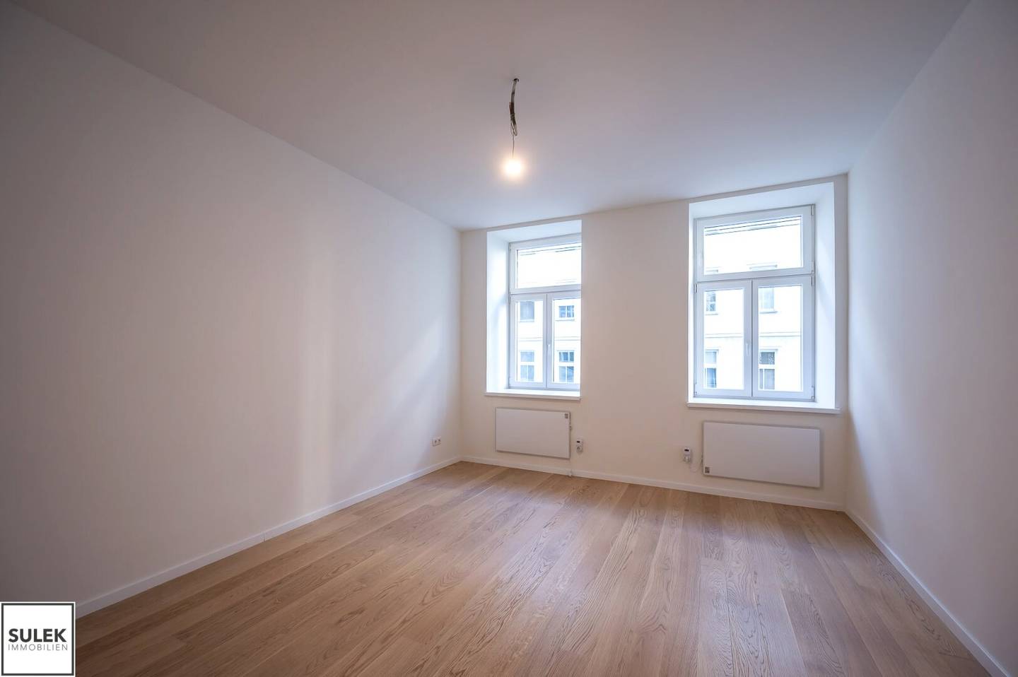 Raised ground floor apartment with storage
